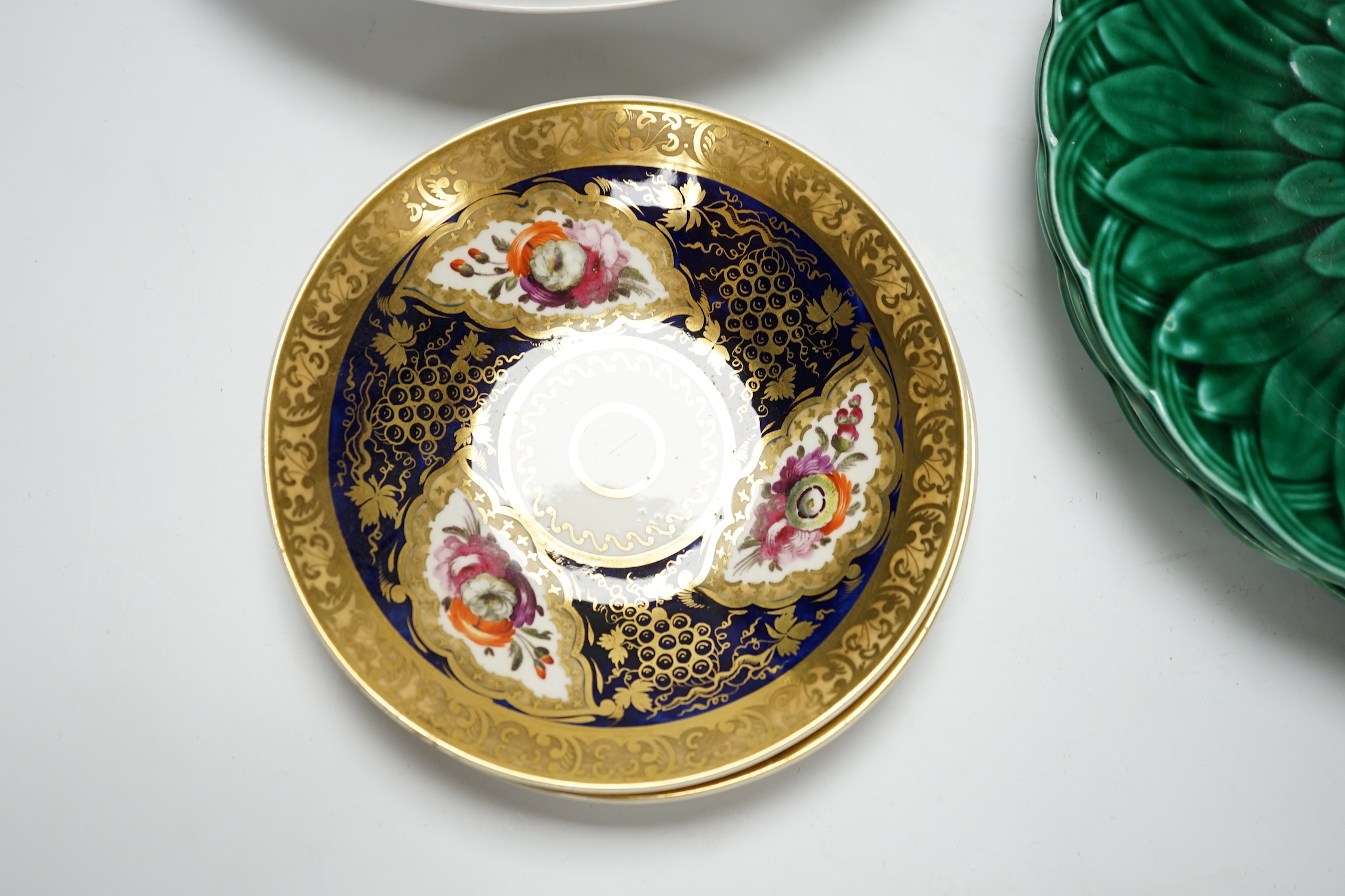 Four Victorian greenware plates, two Spode style vases, a pair of saucers and a blue and white plate